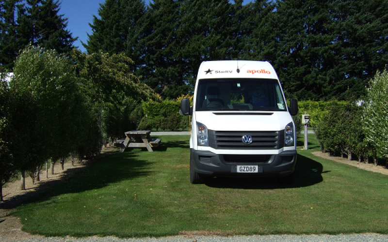 An RV parked at the park